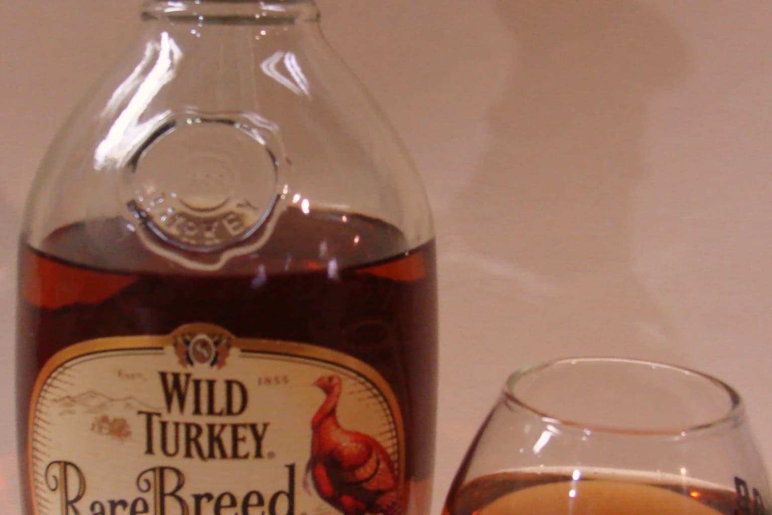 Wild Turkey Rare Breed bottle — brand mark and Kentucky straight bourbon whiskey on the main label
