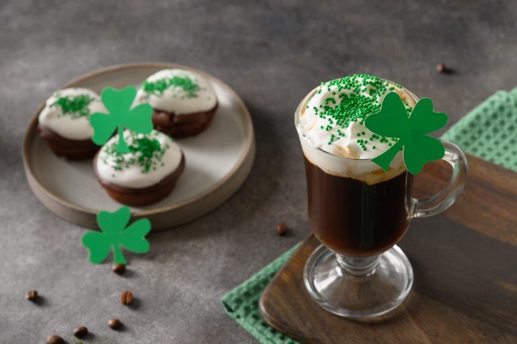 Irish Mule in a highball or copper mug over ice, pale gold, lime wheel.
