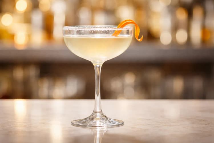 A Top-Shelf Margarita in a chilled coupe with an orange twist.