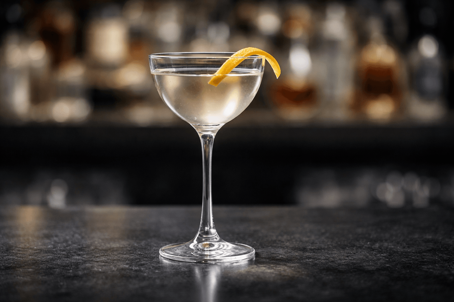 A Coronation in a Nick & Nora glass with a lemon twist.