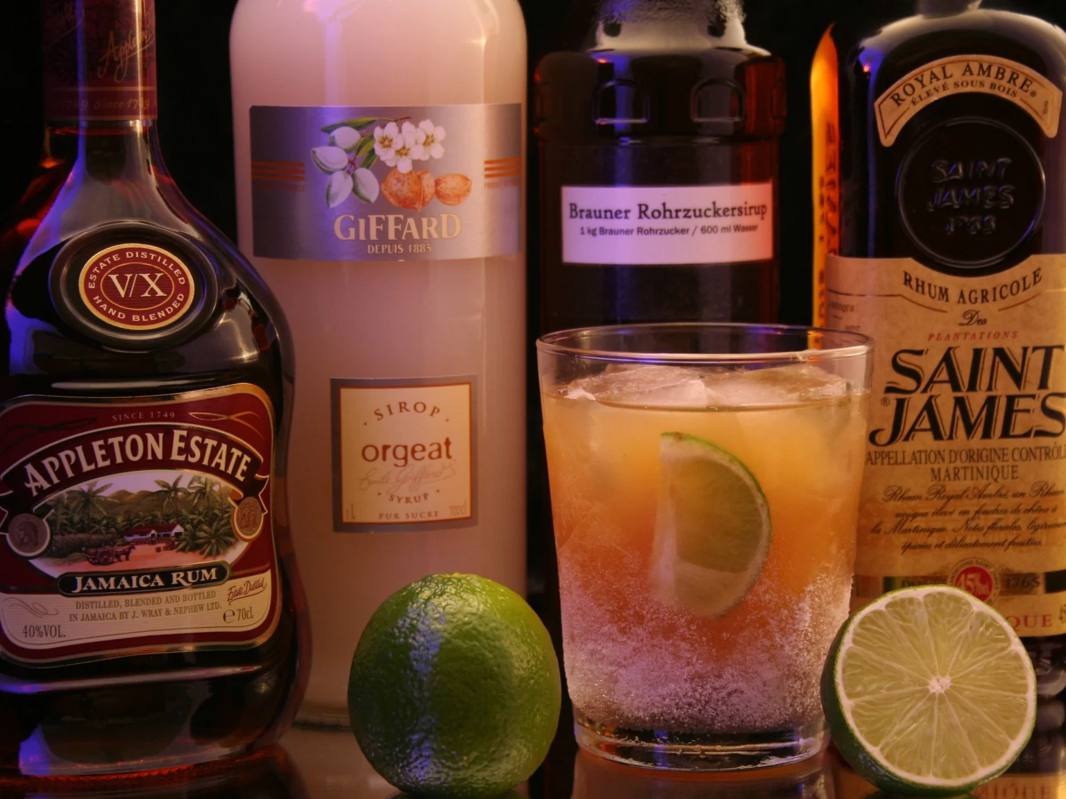 A Mai Tai in a rocks glass with Jamaican rum, agricole, orgeat, and lime