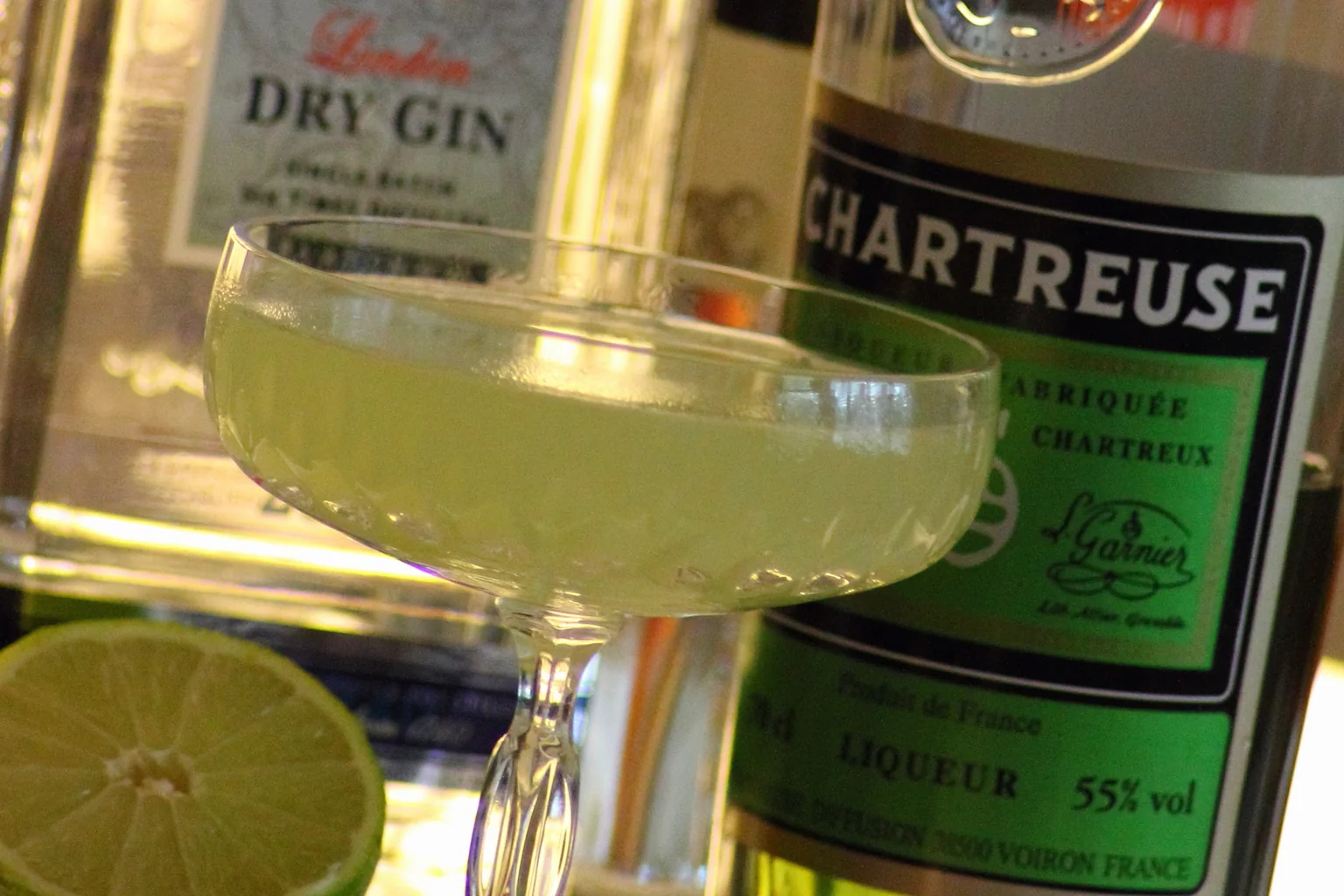 A Last Word in a cut coupe, pale green, with lime and Chartreuse behind